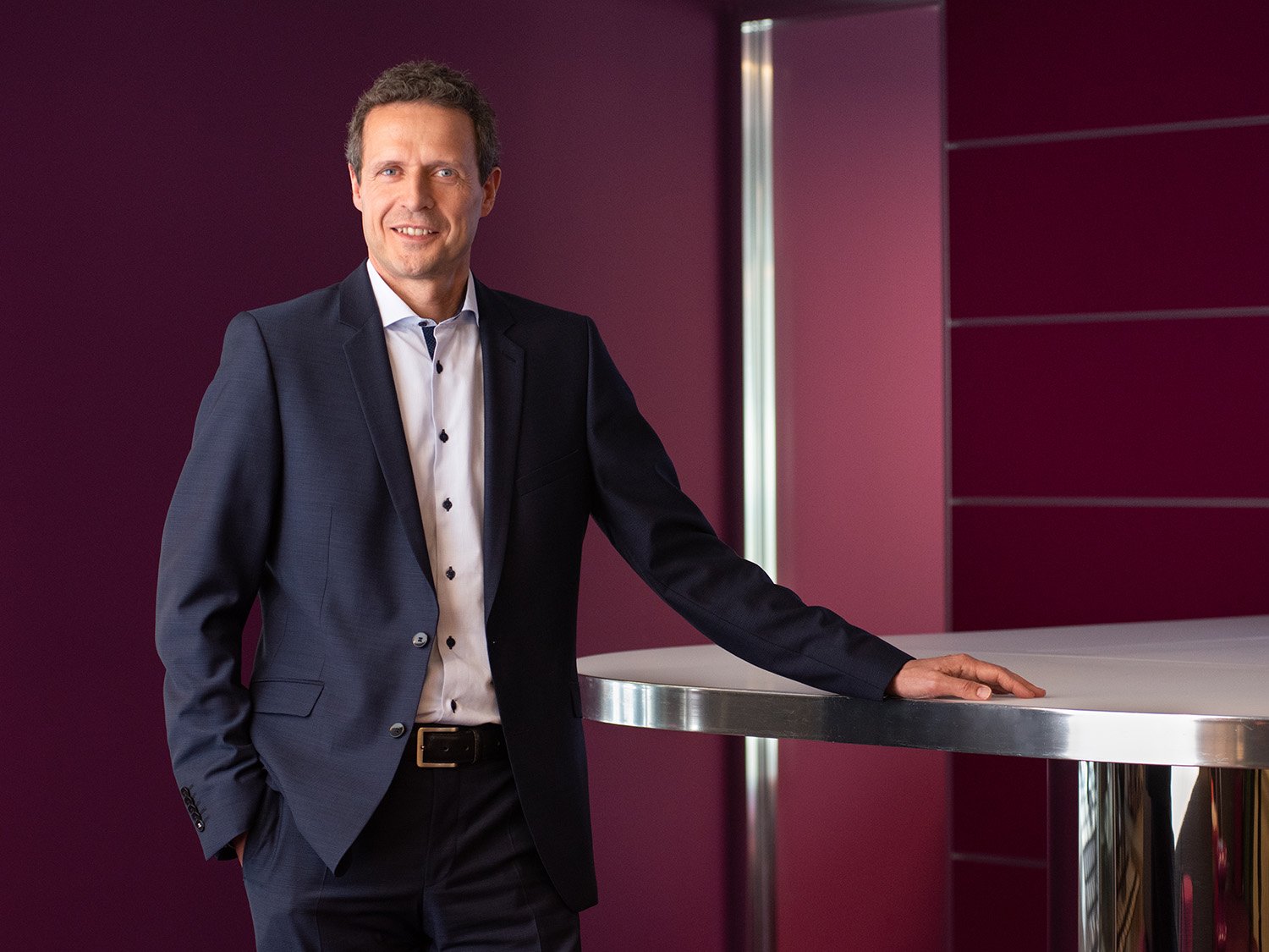 A professional portrait of Detlef Scholz in a Morningstar office.